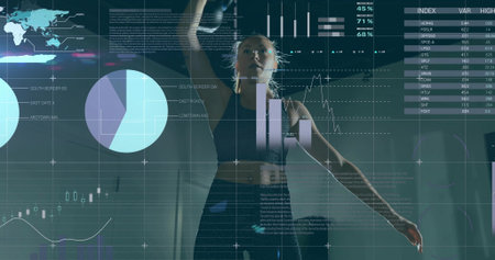 Female athlete lifting kettlebell overhead in training studio, with performance data overlays. Fitness, analytics, strength, modern, data-driven, technology, empowermentの写真素材