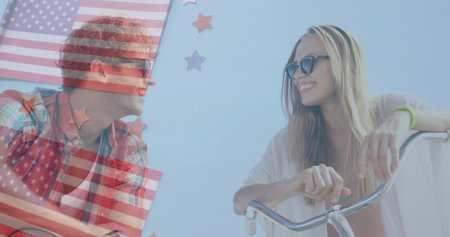 Smiling friends wearing sunglasses leaning on bike handlebars at boardwalk. Summer, leisure, outdoor, celebration, camaraderie, vibrant, adventureの写真素材