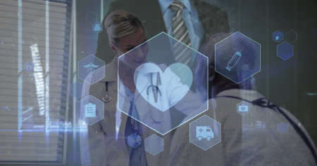 Doctor with stethoscope consulting patient in gown in room, hex icons overlaying blinds. Medical,...