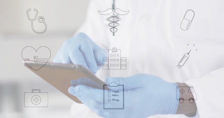 Tapping doctor wearing lab coat and gloves in hospital with digital tablet, floating medical icons. Medical, healthcare, digital, interface, professional, clinical, technologyの写真素材