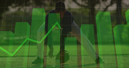 Fielding ball infielder in full uniform crouching on infield grass, with glove and data overlay....