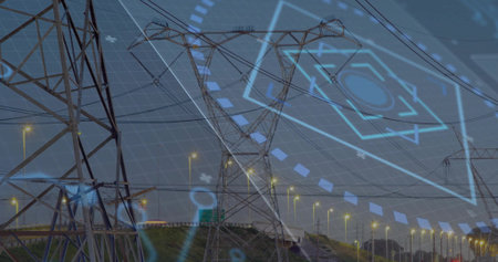 Spanning lattice towers and power lines above highway at dusk with streetlights and digital overlay....