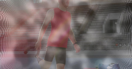 Standing man wearing sportswear in mapping space with dot matrix overlay, face projection, display. Technological, futuristic, digital art, innovative, immersive, contemporary, gadgetの写真素材
