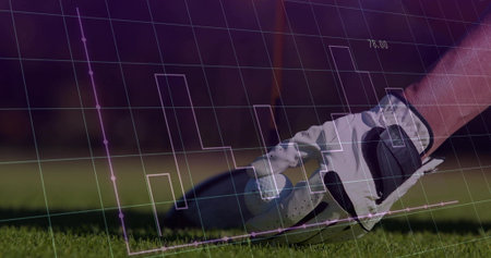 Positioning gloved hand adjusting golf club head on trimmed turf at golf course, with data overlay. Sports, performance, precision, analytics, fitness, technology, recreationの写真素材