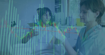 Pointing nurse in scrubs stethoscope toward tablet at bedside patient holding pill bottle, charts. Medical, healthcare, digital, diagnosis, wellness, clinical, technologyの写真素材