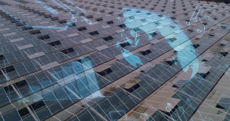 Showing aerial view capturing solar panels across open field, with globe overlay and circuit nodes....