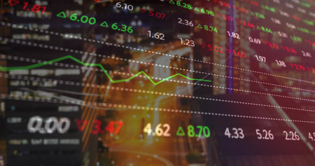 Displaying floating stock data, dotted grid and green trend graph over nighttime intersection. Urban, technology, data, analytics, nightlife, innovation, financeの写真素材