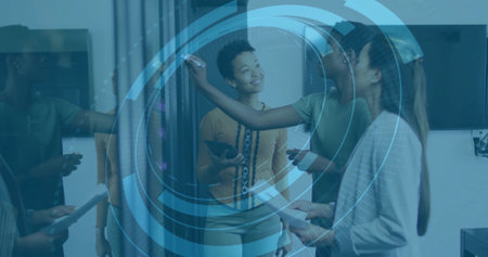 Collaborating three women wearing business attire writing at whiteboard in office, with tablet. Innovation, teamwork, brainstorming, communication, professional, modern, productivityの写真素材