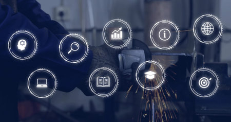 Worker grinding steel in workshop wearing gloves, using angle grinder. Metalwork, industrial,...