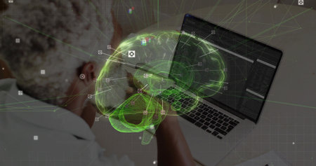 Senior researcher examining code on laptop in lab, holographic brain, interface icons, copy space....
