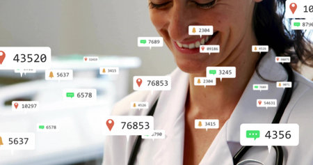 Monitoring digital notifications doctor wearing lab coat in clinic with stethoscope, copy space. Medical, technology, healthcare, modern, clinical, data, communicationの写真素材