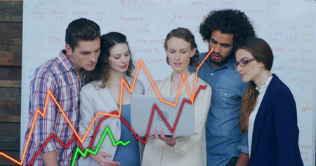 Coworkers analyzing project data on laptop in meeting room, with whiteboard and graphs overlay. Collaboration, teamwork, innovation, workspace, analytics, brainstorming, professionalの写真素材
