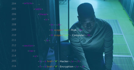 Kneeling IT technician inspecting server rack in data center, with cables, copy space. Technology, cybersecurity, engineering, modern, professional, digital, infrastructureの写真素材