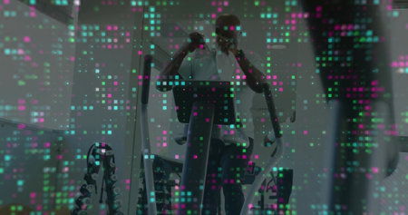 Holding smartphone while pedaling elliptical in home gym, with dumbbell rack, overlay. Fitness, workout, health, strength, training, modernの写真素材