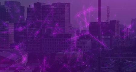 Displaying network overlay streaming across city skyline at dusk, with towers, chimney and mast....