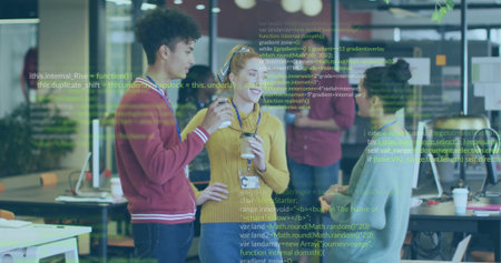 Discussing code, three lanyard clad colleagues holding coffee in office, with code overlay. Collaboration, teamwork, innovation, modern, technology, startup, creativeの写真素材