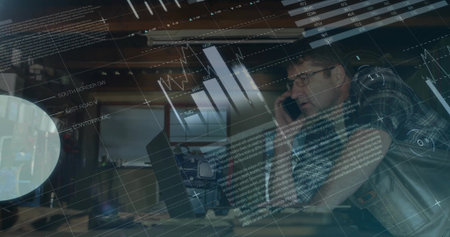 Leaning man wearing plaid shirt glasses calling smartphone, monitoring laptop at office, copy space....