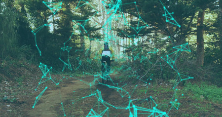 Riding adult cyclist mountain bike along forest trail, with helmet hydration pack, digital network....