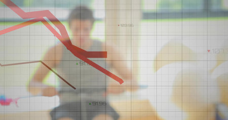 Rowing man in sportswear using rowing machine pushing sliding seat in home gym, with grid overlay. Fitness, workout, exercise, modern, digital, health, trainingの写真素材