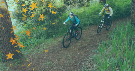 Leading woman cyclist guiding male partner on forest trail, mountain bikes and backpacks. Adventure,...