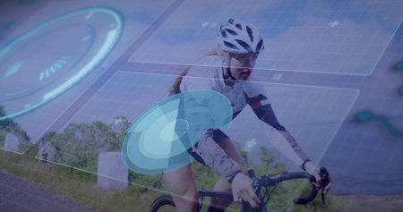 Pedaling female cyclist wearing helmet and gloves on road bike along coastal road, with HUD overlay. Athletic, recreation, technology, adventure, outdoors, fitness, innovationの写真素材