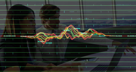 Discussing data woman in blazer, two men studying laptop at meeting table, with line graph overlay. Business, teamwork, corporate, analysis, modern, collaboration, skylineの写真素材