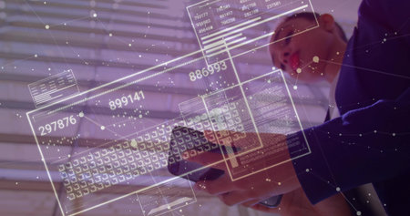 Holding tablet businessman viewing network data panels in office space, copy space. Technology,...