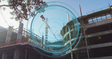 Tower cranes lifting beams at building site, with metal scaffolding and digital holographic overlay....