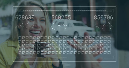 Smiling woman holding ceramic mug while receiving item at sidewalk table, with white delivery van. Candid, cheerful, urban, lifestyle, friendship, vibrant, casualの写真素材