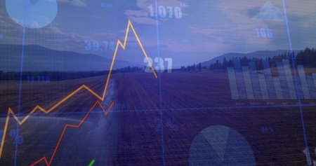 Blending rural field stretching toward hills under cloudy sky, with grid overlay and line plot. Agriculture, finance, data visualization, analysis, landscape, charts, ruralの写真素材