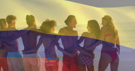 Standing eight friends linking arms at sandy beach, gazing at sunset sky, with swim trunks, bikinis. Friendship, camaraderie, relaxation, leisure, serenity, vibrant, energeticの写真素材