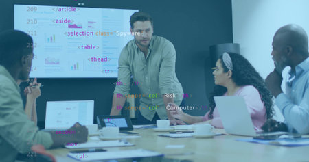 Presenting man in green shirt leading discussion at boardroom, with projection screen and laptops. Collaboration, teamwork, corporate, innovation, technology, communication, professionalの写真素材