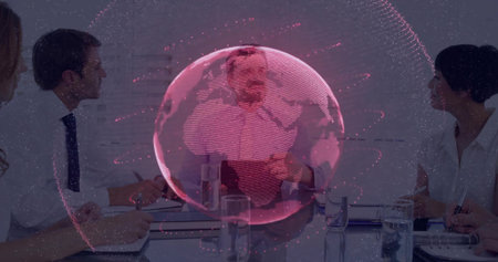 Collaborating team interpreting data on holographic globe projection in meeting room, with laptops. Business, teamwork, innovation, technology, strategy, professional, communicationの写真素材