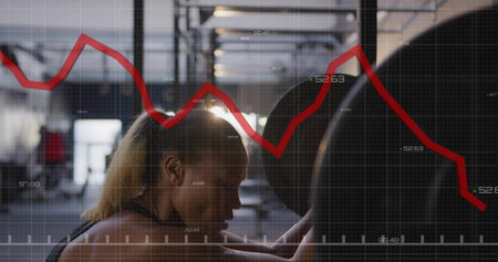 Bracing woman in sports top gripping loaded barbell under rack in gym, with grid graph overlay....