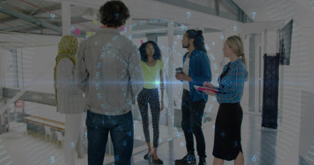 Brainstorming team standing in modern loft office, with glass partition sticky notes and coffee cup. Collaboration, innovation, creative workspace, teamwork, startup environment, dynamic, modern designの写真素材