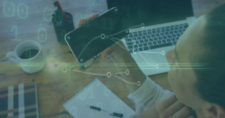 Visualizing data on phone, analyst working at office with laptop notepad pen holder, copy space....