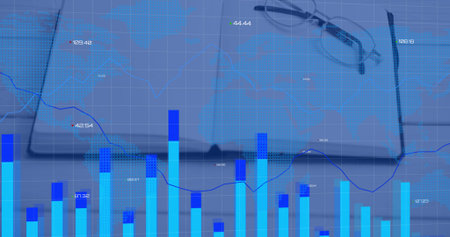 Displaying bar chart and line graph overlays on office desk, with open notebook, pen and eyeglasses. Analytics, finance, data, productivity, technology, workspace, designの写真素材