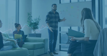 Presenting male professional showing ideas on whiteboard at office with sticky notes and green sofa. Collaboration, teamwork, brainstorming, modernity, productivity, innovation, workspaceの写真素材