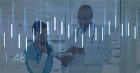 Pointing doctor with stethoscope and scrub nurse examining tablet in clinic corridor, data overlays....