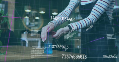 Adjusting woman in overalls manipulating holographic grid and data at cafe table with blue cube. Technology, innovation, workspace, modern, augmented reality, digital interface, creativeの写真素材