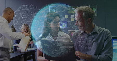 Analyzing laptop, woman and man in suits leaning in at conference table with digital globe overlay. Collaboration, teamwork, innovation, technology, data analysis, professional, brainstormingの写真素材