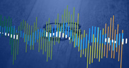 Resting black-rimmed eyeglasses lying on blue-lit desk, showing colorful audio waveform. Technology, innovation, multimedia, digital, modern, creative, designの写真素材