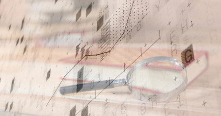 Resting magnifying glass on desk in office with glasses frame and digital overlays, copy space....