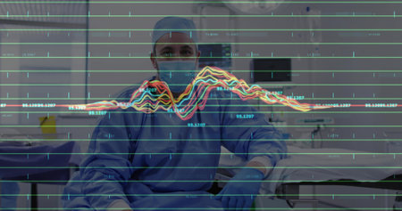 Sitting surgeon in blue scrubs in operating room, with line graph overlay and instrument tray. Medical, technology, professional, healthcare, diagnostics, analytical, clinicalの写真素材