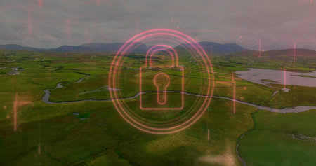 Hovering neon pink digital padlock icon showing security interface over rural fields with waterways. Aerial, landscape, digital, security, technology, rural, naturalの写真素材