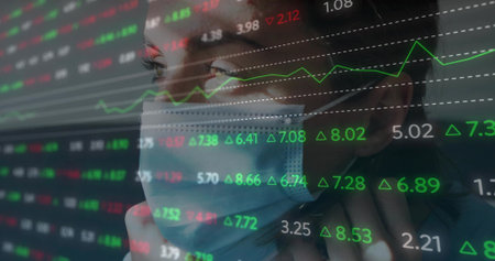 Finance analyst wearing surgical mask analyzing market data in trading office, with ticker overlay. Finance, technology, analytics, professional, digital, business, investmentの写真素材