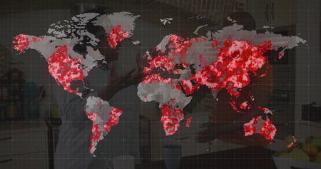 Displaying map with red hotspots over kitchen showing couple wearing aprons stirring frying pan. Global connectivity, culinary, home cooking, warm ambiance, innovative design, cultural exchange, domestic lifestyleの写真素材