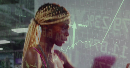 Gripping cardio machine handles, woman wearing pink sports bra training in gym, with chart overlay....