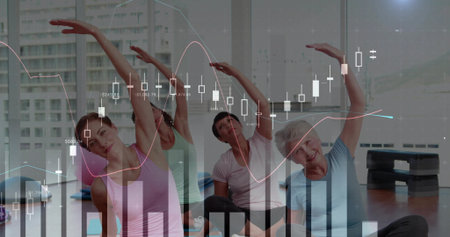 Performing four women stretching laterally on yoga mats in yoga studio. Wellness, flexibility,...