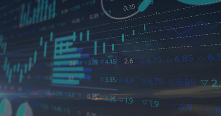Displaying trading dashboard on screen showing candlesticks bar and line graphs, numeric indicators. Finance, stockmarket, analytics, data visualization, technology, investment, digital interfaceの写真素材